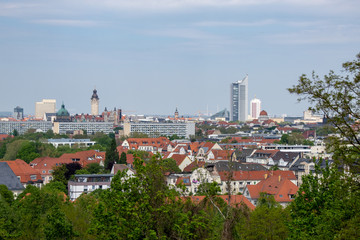 Panorama of the city of Leipzig with views of the new city hall, city skyscraper, monument to the Battle of the Nations.Taken from the mountain Fockeberg