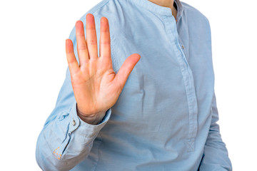 Woman signals defensive attitude with hand