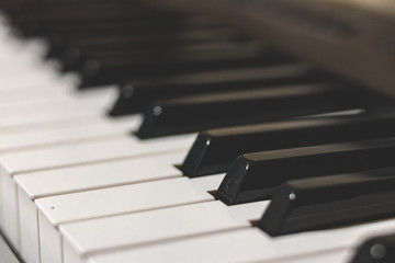 Fototapeta na wymiar Piano Keys Close-up view/shot. Inspiring, emotional, vintage keys