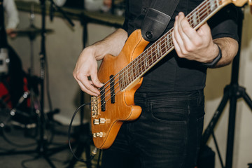 Obraz na płótnie Canvas musician guitar rehearsing tune onstage tunes strings