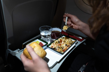 close up of a plate of food served on the airplane
