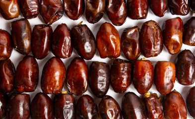 Fresh dates making a background pattern