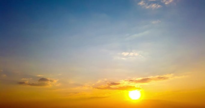 Timelapse of beautiful dramatic sunset with dramatic sky and colorful fluffy clouds. 4K clip