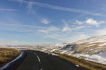 Dramatic winding road and rolling hills - Landscape scenery from Buttertubs Pass, Yorkshire Dales