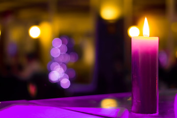 Festive Beautiful Background with single burning candle.