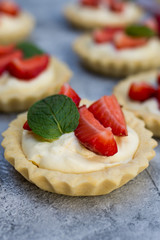 Strawberry tart with cream and mint traditional summer sweet pastry fruit dessert