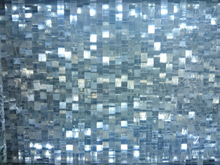 Fototapeta premium Blinky mosaic disco ball texture loks flashingly 60's that reminds us of parties, clubbing, and happy hours