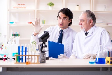 Two chemists working in the lab 