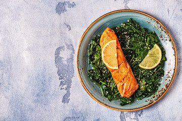Grilled salmon with spinach.