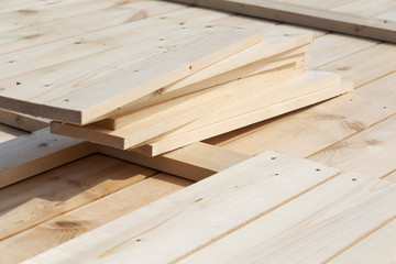 wooden planks on a construction site. Neatly folded.