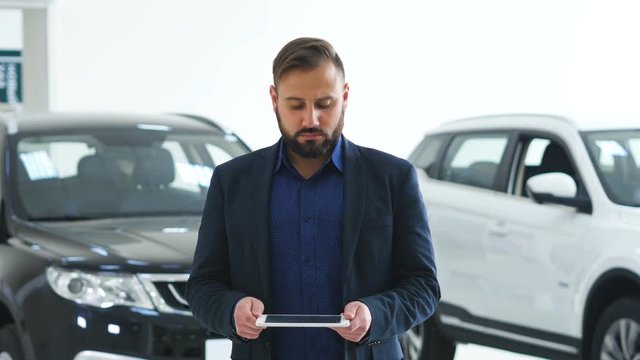 Image for graphic implements. Man in business suit with future technology screen and modern background