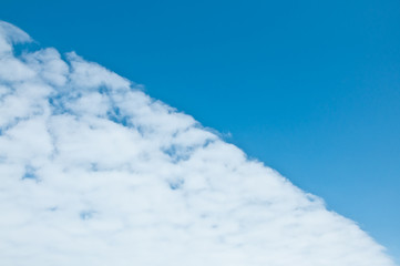 Spring blue sky with clouds. White clouds come on the blue sky.