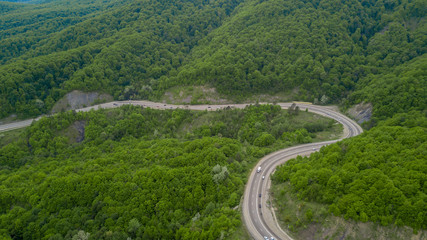 Fototapeta na wymiar Top view serpentine road trough the Caucasian mountains in South Russia