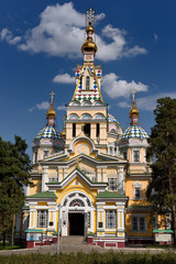 Fototapeta na wymiar Front door west side Ascension Cathedral Russian Orthodox wood church in Almaty Kazakhstan