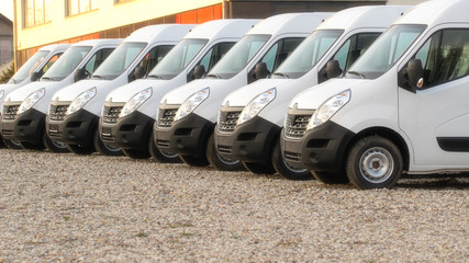 commercial delivery vans parked in row. Transporting service company.