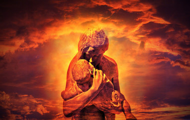 Loving sculpture of a mother holding a baby. A sculpture expressing the most tender and basic of all emotions.It is vertical in configuration.It describes complex human emotions in a sensitive way.