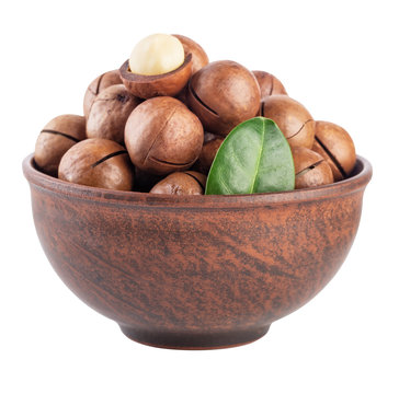 Australian Macadamia Nut With Green Leaf In Brown Plate