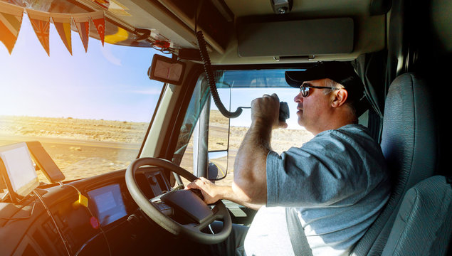 Truck Drivers Big Truck Right Traffic Hands Holding Radio And Steering Wheel