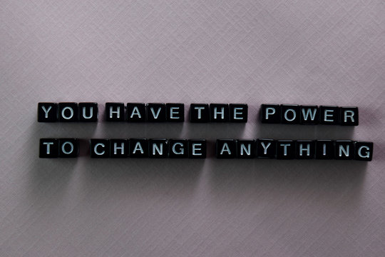 You have the power to change anything on wooden blocks. Motivation and inspiration concept