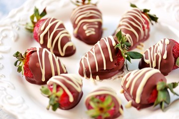 Delicious fresh strawberries in milk and white chocolate.