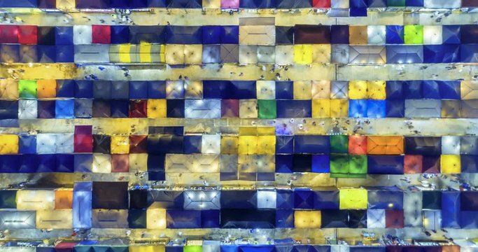 aerial top view train night market ratchada multi color beautiful abstract art time lapse view in bangkok, bangkok market, thailand.