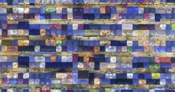 aerial top view train night market ratchada multi color beautiful abstract art time lapse view in bangkok, bangkok market, thailand.