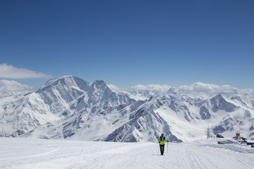 Fototapeta na wymiar The ascent of Elbrus at winter sunny day. Kabardino-Balkaria, Russia