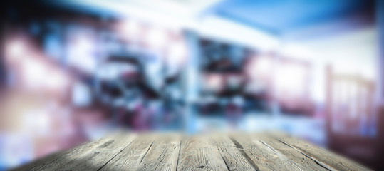 Table background of free space for your decoration and blurred bar. Night Club interior. 