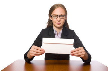 Female employee sitting at long table isolated on white 