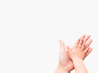Hands of adult and child. Mother and kid put their palms together on white background. Parent and toddler. Symbol of family, unanimity, support.