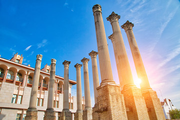 Columns and ruins of the Roman Temple located in city of Cordoba, Andalusia, Spain - obrazy, fototapety, plakaty