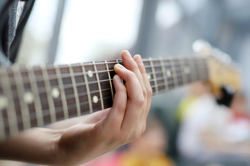 playing the guitar