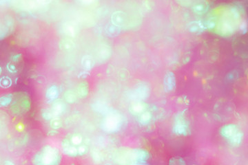 Pink Sparkling Glitter on White Background Bokeh Abstract Close Up