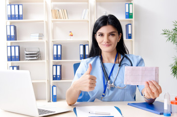 Female doctor cardiologist working in the clinic