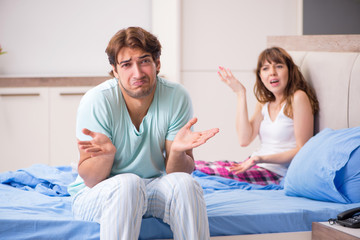 Obraz premium Young couple in the bedroom 