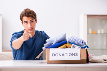 Concept of charity with donated clothing