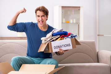 Obraz premium Concept of charity with donated clothing