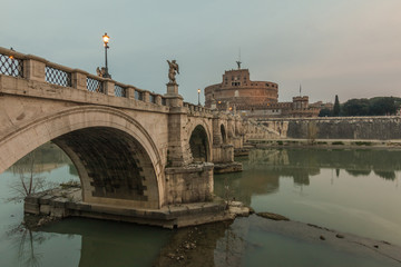 Aurelius bridge with the Castle Sant'Angelo in the morning at dusk in the center of the historic...
