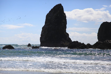 huge rock on the ocean 