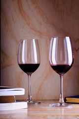 Two glasses of red wine on a table