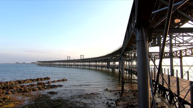 Mining pier of Riotinto Co., known as the Tinto Dock "Muelle del Tinto" at evening in Huelva, Andalusia, Spain