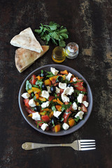 Arabic salad with vegetables, olives and feta.
