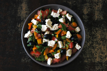 Arabic salad with vegetables, olives and feta.