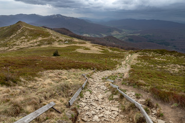 Empty trail in the mountains of central europe. A path leading high in the mountains.