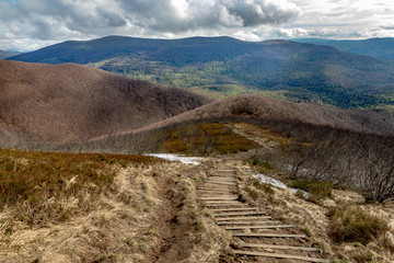 Fototapeta na wymiar Empty trail in the mountains of central europe. A path leading high in the mountains.