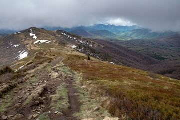 Empty trail in the mountains of central europe. A path leading high in the mountains.