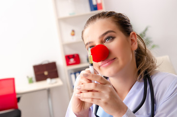 Funny female doctor working in the clinic 