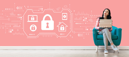 Security theme with young woman using a laptop computer 