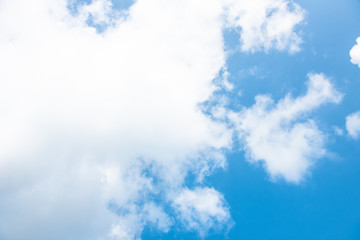 Nature Bright blue Sky with white clouds on blackground. Beautiful sky and clouds in the afternoon.