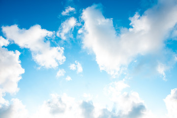 Nature Bright blue Sky with white clouds on blackground. Beautiful sky and clouds in the afternoon.